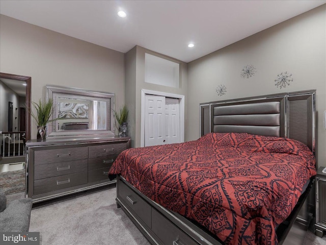 carpeted bedroom with a closet