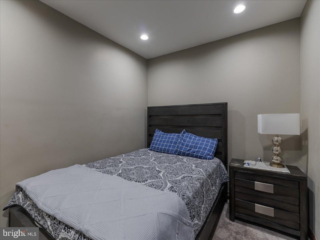 bedroom featuring carpet