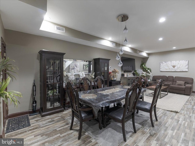 dining room featuring hardwood / wood-style flooring