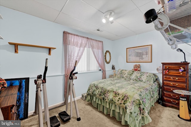 bedroom featuring light colored carpet