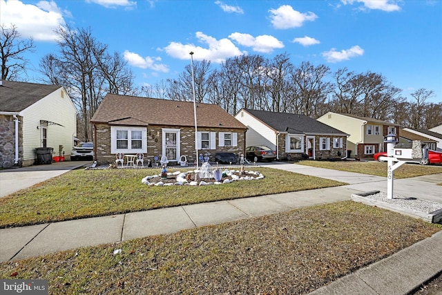 ranch-style house with a front yard