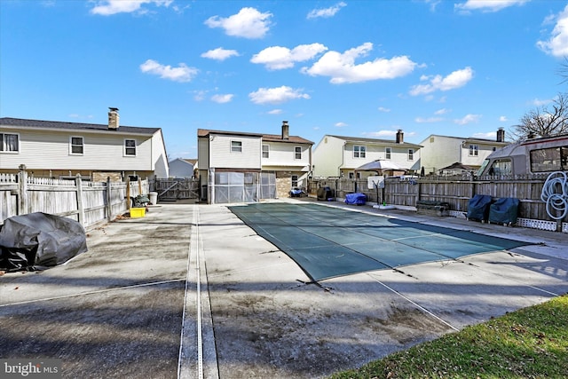 view of pool featuring a patio