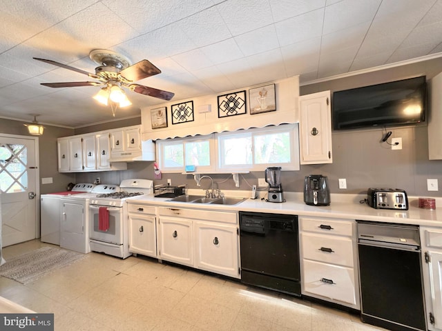 kitchen with sink, white gas stove, white cabinetry, washer and dryer, and black dishwasher