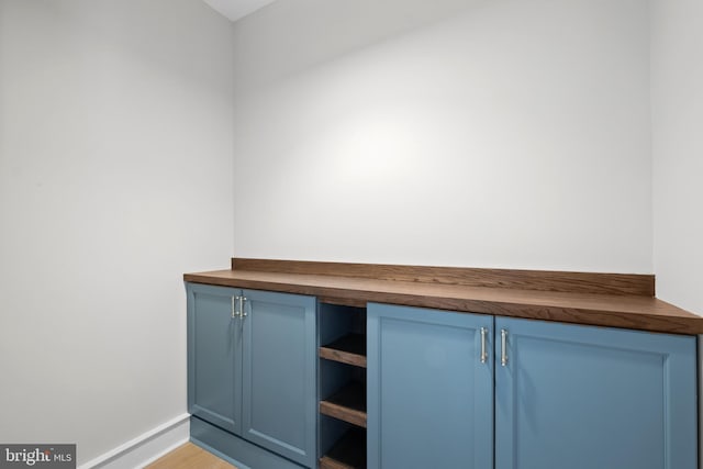 unfurnished office featuring light wood-type flooring