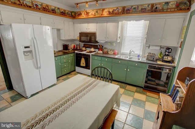 kitchen with green cabinetry, sink, white cabinets, and black appliances