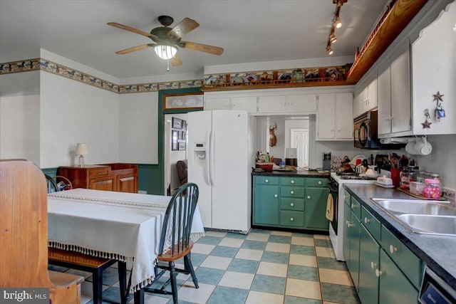 kitchen with white cabinetry, white appliances, ceiling fan, and sink