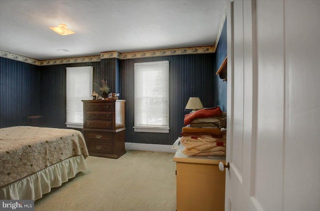 bedroom with light colored carpet