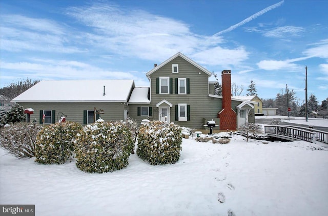 view of snow covered property