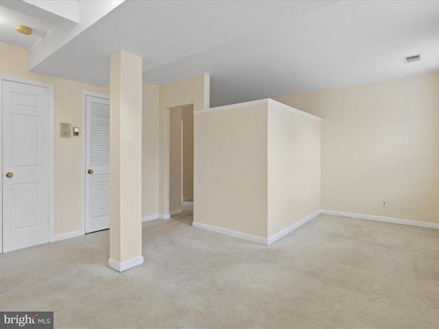 basement with light carpet