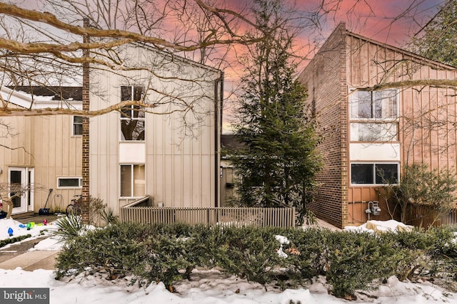 view of snow covered property