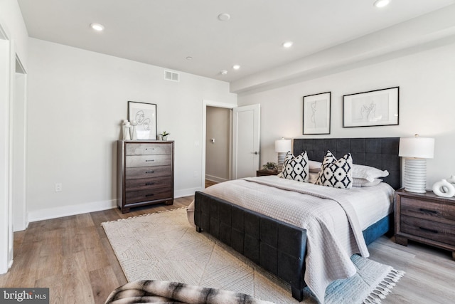 bedroom with light hardwood / wood-style floors