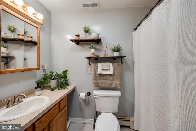 bathroom with vanity, a baseboard radiator, tile patterned floors, and toilet