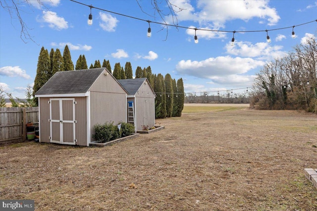 view of yard with a storage shed