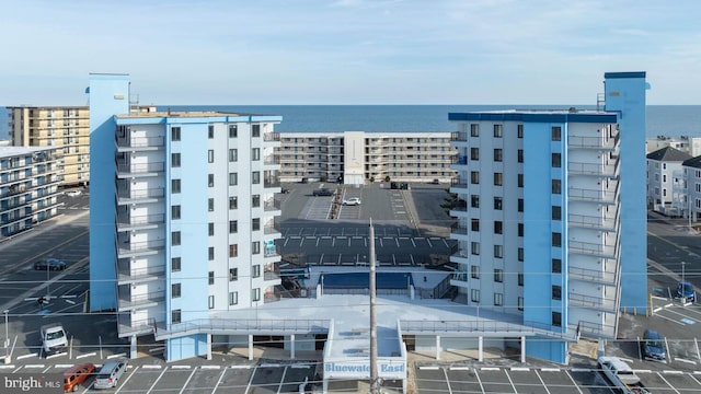 view of building exterior featuring a water view