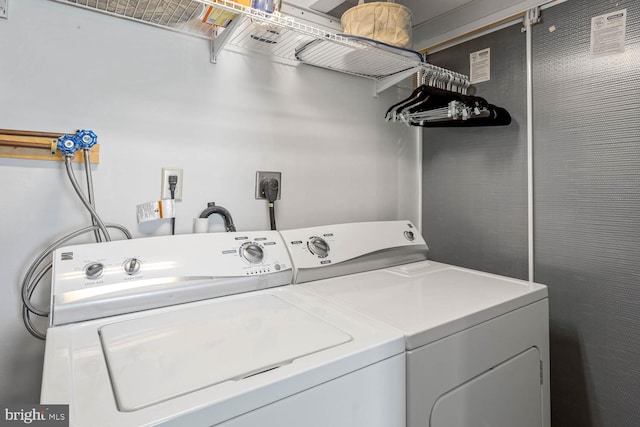 washroom with washer and clothes dryer