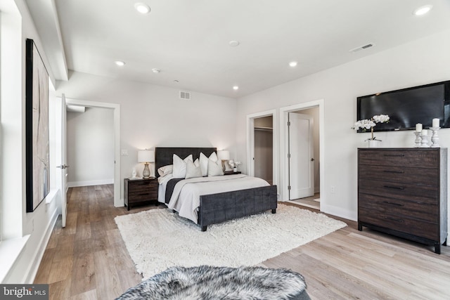 bedroom featuring light hardwood / wood-style floors