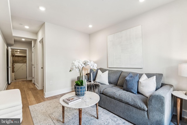 living room with light hardwood / wood-style floors