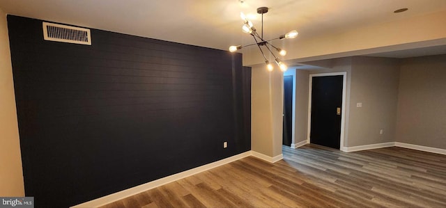 empty room featuring dark wood-type flooring