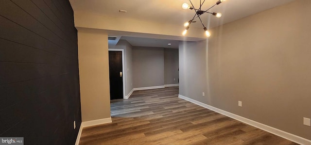 spare room featuring hardwood / wood-style flooring