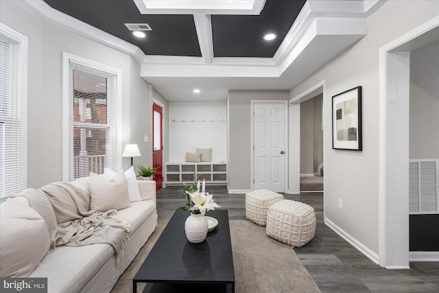 living room featuring crown molding, dark wood-type flooring, beam ceiling, a skylight, and coffered ceiling