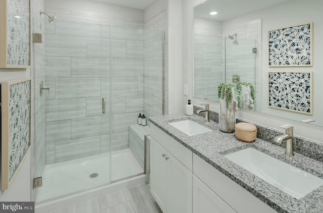 bathroom with vanity and walk in shower