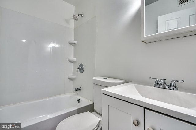 full bathroom featuring vanity, toilet, and washtub / shower combination