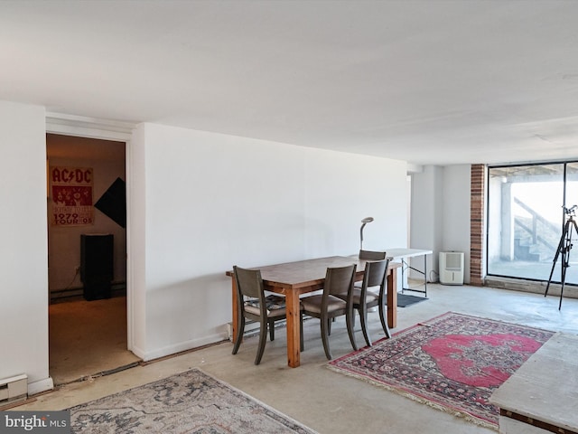 dining space featuring a baseboard radiator