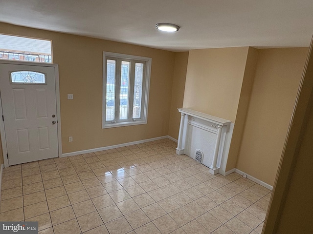 entryway featuring light tile patterned flooring