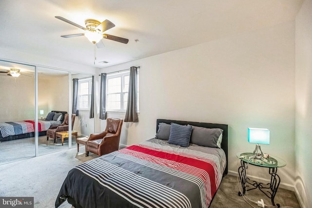 carpeted bedroom featuring a closet and ceiling fan