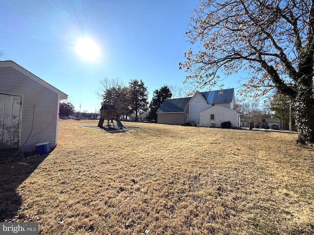 view of yard featuring a playground