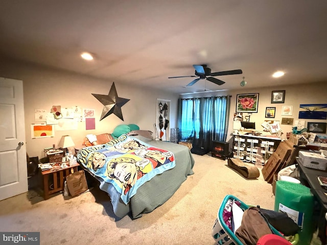 carpeted bedroom with ceiling fan