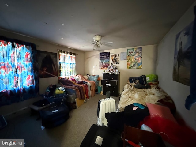 bedroom featuring carpet floors and ceiling fan