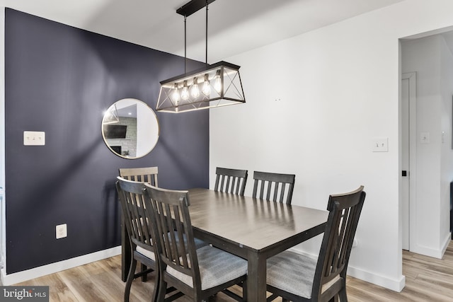 dining room featuring light wood-type flooring