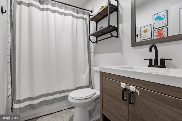 full bathroom with vanity, toilet, and shower / bath combo