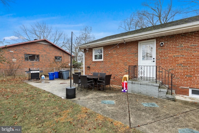 rear view of house with a patio