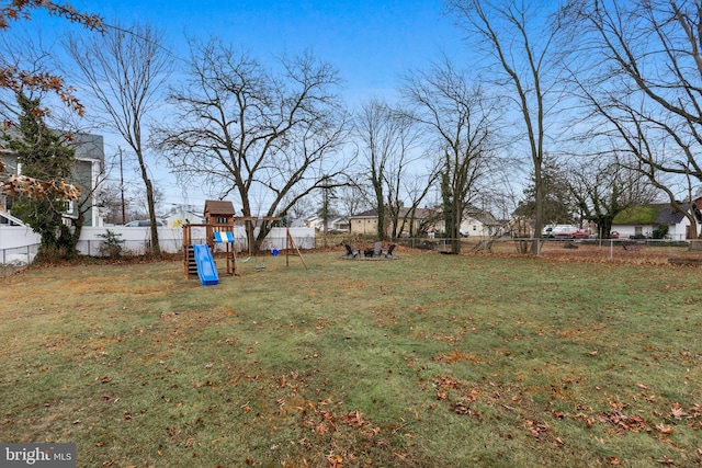 view of yard featuring a playground