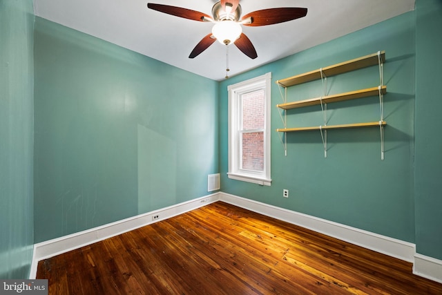 unfurnished room with hardwood / wood-style flooring and ceiling fan