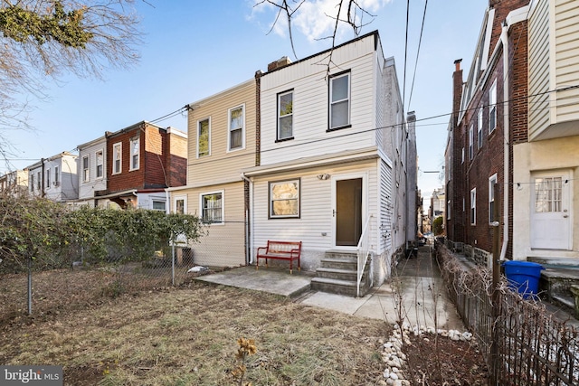 view of front of home featuring a patio