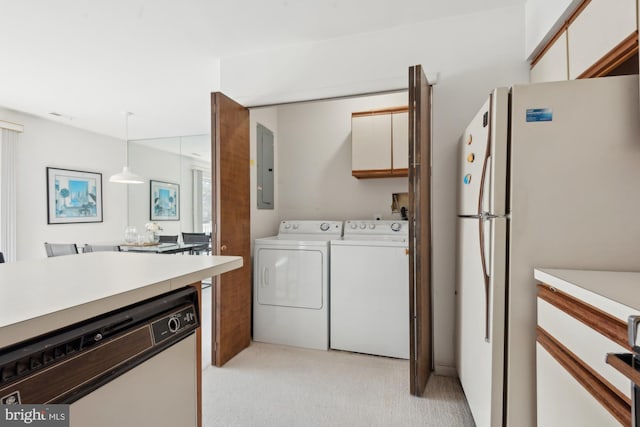 clothes washing area with electric panel and washing machine and clothes dryer