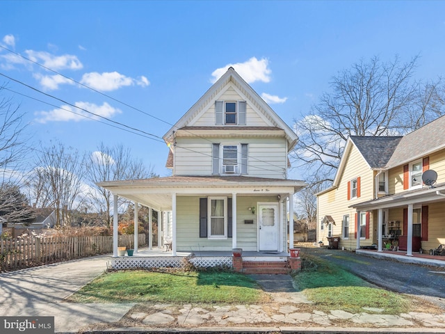 view of front of property featuring covered porch