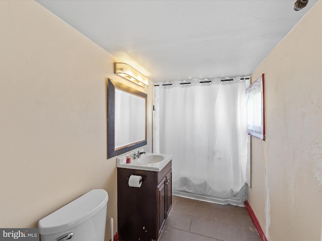 full bathroom with tile patterned flooring, vanity, shower / bathtub combination with curtain, and toilet