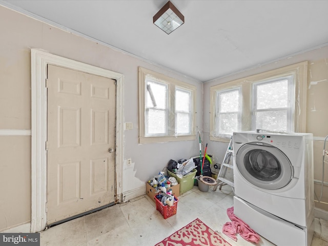 laundry area featuring washing machine and dryer