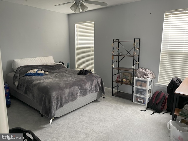 bedroom featuring carpet and ceiling fan