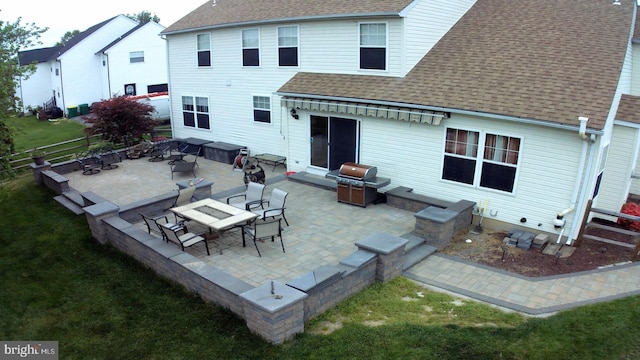 back of property with a patio area