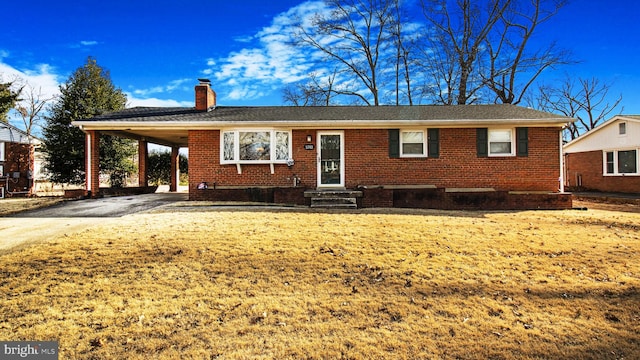 view of front of home featuring a carport