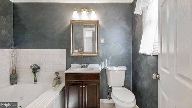 bathroom featuring vanity, toilet, and a bathtub