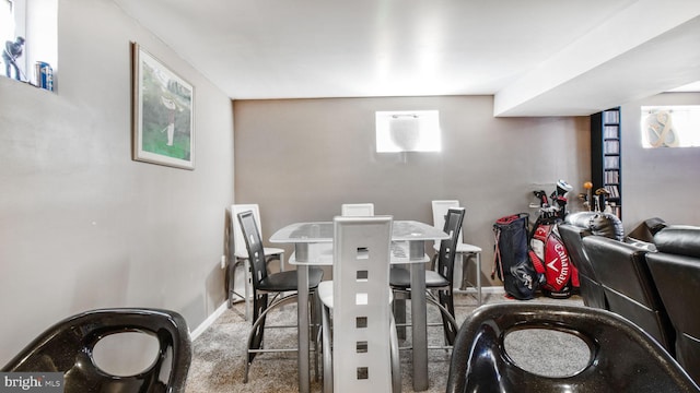 view of carpeted dining space