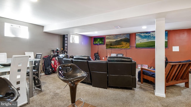 home theater room featuring carpet flooring