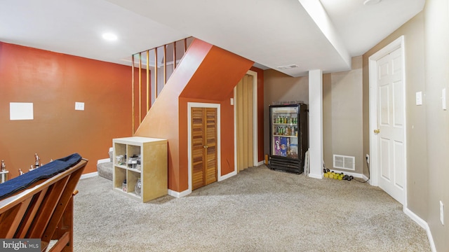 interior space featuring carpet