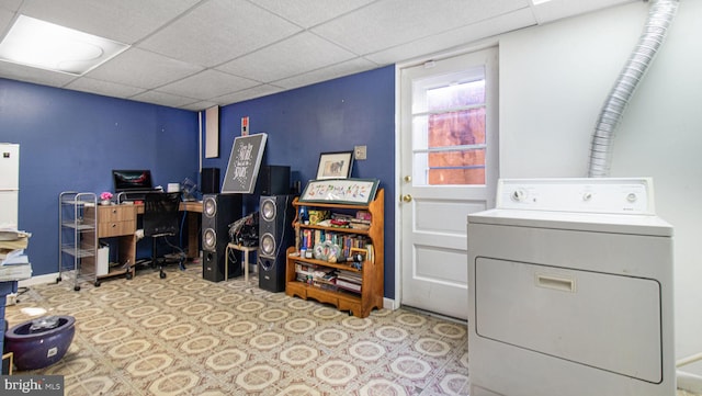 office area featuring washer / clothes dryer and a drop ceiling